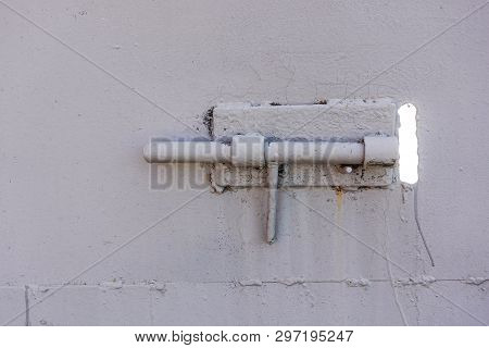 Close Up Of Door Locked With Iron Latch
