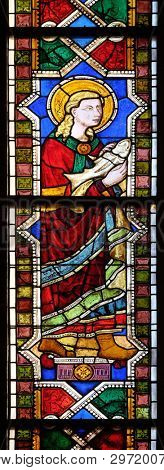 FLORENCE, ITALY - JANUARY 10, 2019: Saint Raphael the Archangel, stained glass window in the Basilica di Santa Croce (Basilica of the Holy Cross) - famous Franciscan church in Florence, Italy