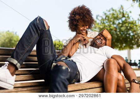 Outdoor Protrait Of Black African American Couple Embracing Each Other