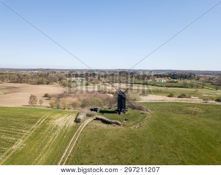 Hoejerg, Denmark - April 23, 2019: Aerial View Of The Historic Danish Windmill Called Pibe Moelle.