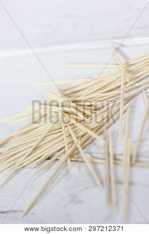 Bamboo Toothsticks On The White Table. Great Photo For Your Needs.