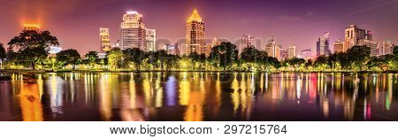 Panoramic view of Bangkok skyline. Night cityscape of Bangkok, Thailand. View from Lumphini park