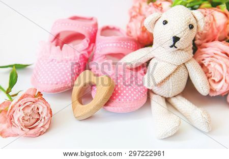 Newborn. Baby Accessories On A Light Background. Selective Focus.
