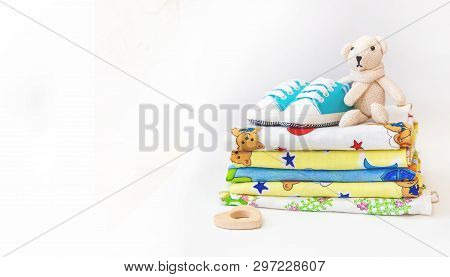 Newborn. Baby Accessories On A Light Background. Selective Focus.