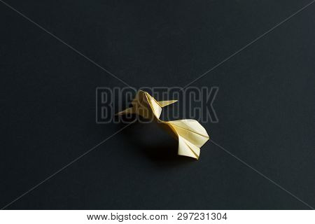 Handmade Paper Craft Origami Gold Koi Carp Fishes On Black Background.top View, Pattern