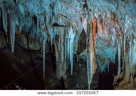 Sorek Cave, Israel. Stalactites In The Form Of Icicles Hang From The Ceiling Of The Cave.