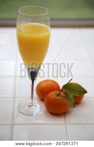 Mimosa. Champagne and Orange Juice. Oranges with Champagne Mimosa brunch. 