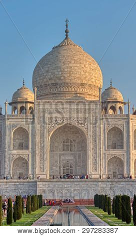 Agra, India - March 5 2018: Tourists Sighteseeing, Exploring And Admiring Famous The Taj Mahal