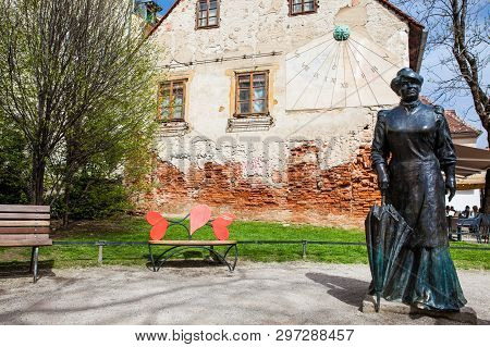 Zagreb, Croatia - April, 2018: Statue Of Famous Writer Marija Juric Zagorka And Sun Clock In Zagreb