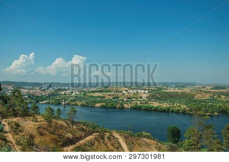 Valley With The Wide Tejo River And Hills Covered By Undergrowth And Industry On Horizon, Near Caste