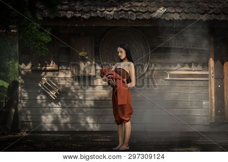 Woman Ghost Drama And Carrying Her Baby Ghost Standing On Old Thai House / Horror Legend Of Mae Nak 