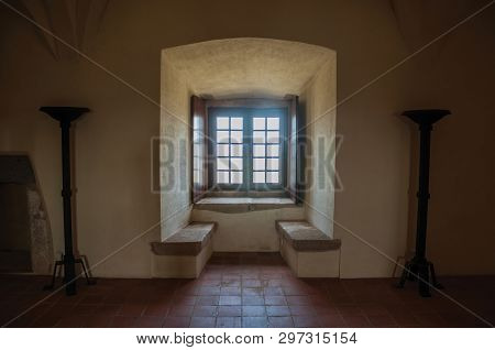 Evoramonte, Portugal - July 6, 2018. Hall with thick wall and stone bench at the Castle of Evoramonte. A tiny fortified civil parish over hill where stands out its historic castle in Portugal.