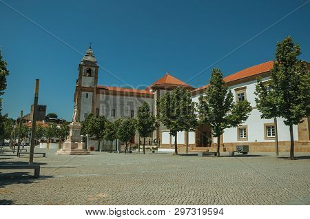 Castelo De Vide, Portugal - July 10, 2018. Houses And Steeple In Baroque Style On Square With Statue