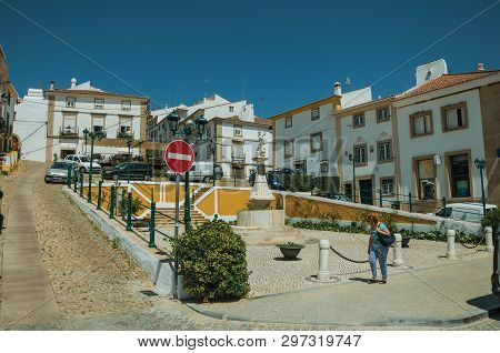 Castelo De Vide, Portugal - July 10, 2018. Old Colorful Houses Around Square And Pedestrian At Caste