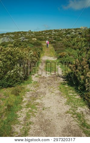 Serra Da Estrela, Portugal - July 12, 2018. Woman And Little Girl Walking In A Trail On Highlands At