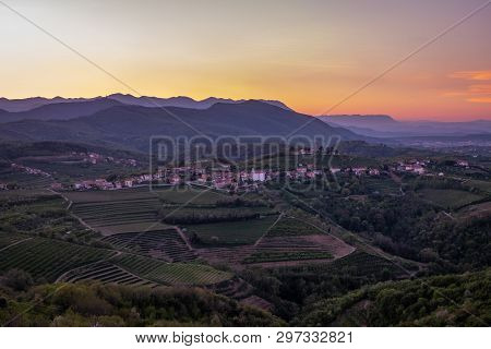 Small Village Kojsko With Chirch Križ On The Hill On Sunrise Between The Vineyards In The Wine Regio