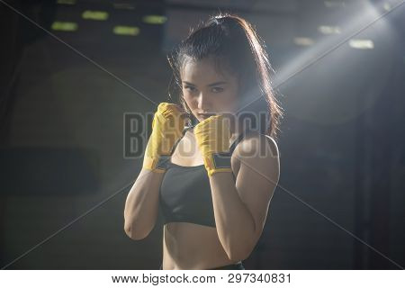 Boxing Woman Prepare To Trianing Session And Kickboxing,workout At Thai Boxing Gym.fit Female Exerci