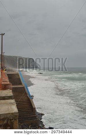 Entrance Stairs To The Beach On A Cloudy Day At Playa Grande In Colares. Nature, Architecture, Histo