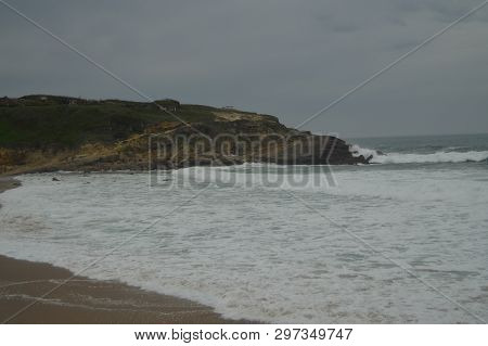 Wonderful Cliff On A Cloudy Day On Big Beach In Colares. Nature, Architecture, History, Street Photo