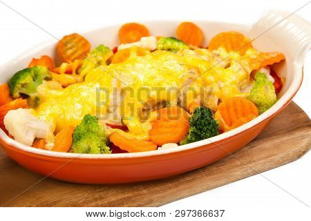 Baked Fish With Vegetables In A Baking Dish. Tasty And Useful Food. In A Ceramic Form For Baking On 