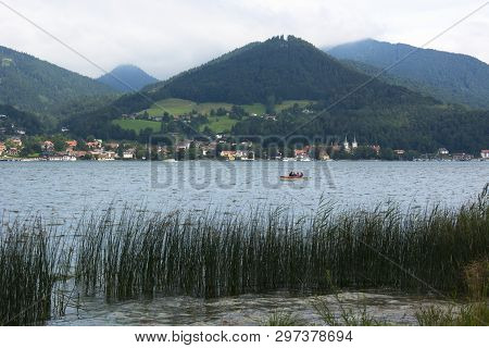 A View Of Lake Tegernsee In Germany On A Cloudy Summer Day