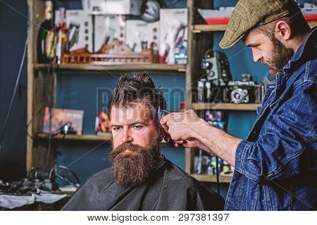 Barber With Clipper Trimming Hair On Temple Of Client. Hipster Lifestyle Concept. Hipster Client Get