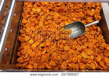 Dried Apricots With A Large Metal Spoon / Scoop Ready To Be Sold Unpackaged To The Environmentally C