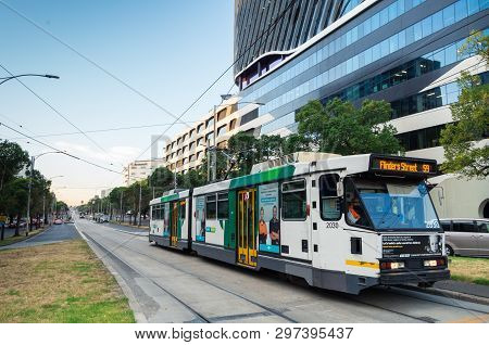 Melbourne, Australia - March 7, 2019: Trams Travelling Along Flemington Road Bisecting Parkville And