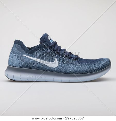 Vienna, Austria - August 7, 2017: Nike Free Rn Flyknit 2017 Dark Blue Sneaker On White Background.