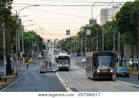 Melbourne, Australia - March 7, 2019: Trams Travelling Along Flemington Road Bisecting Parkville And