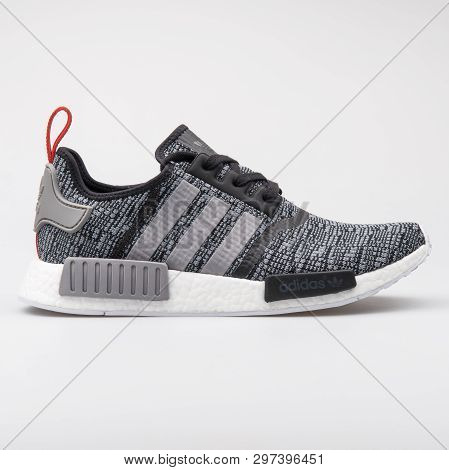 Vienna, Austria - August 7, 2017: Adidas Nmd R1 Black And Grey Sneaker On White Background.