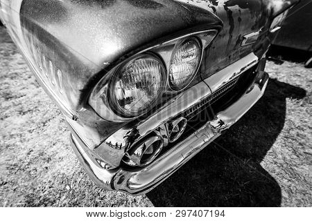 Berlin - May 05, 2018: Headlamp Of The Full-size Car Chevrolet Bel Air (third Generation). Black And