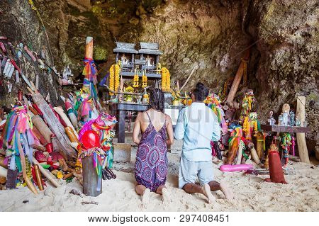 Krabi, Thailand - February 12. 2019: Couple, Man And Woman Pray Fertility Goddess For Pregnancy In F
