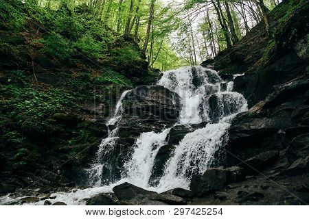 Close Up Of Cold Fresh Waterfall. Waterfall Shypit, Cascade In Pylypets In The Forest. Carpathian Mo