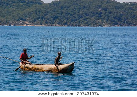 Lake Malawi, Malawi, 4/3/07  Two Men In A Canoe On Lake Malawi, Malawi