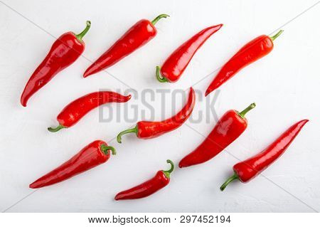 Red Pepper Pattern On White Background. Top View,  Flat Lay, Close-up. Ramiro Pepper. Food Concept.