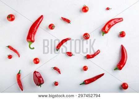 Red Pepper And Tomato Pattern On White Background. Top View,  Flat Lay, Close-up. Ramiro And Chili P