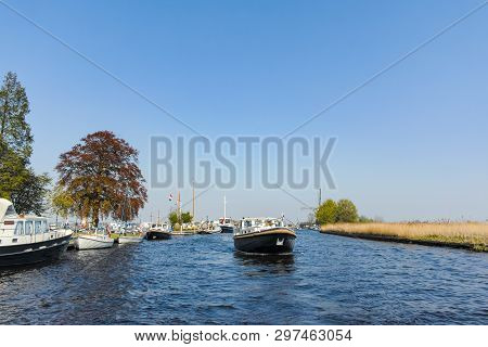 Landscape With Waterways And Canals Of North Holland With Boats, Canal-side Lifestyle In The Netherl