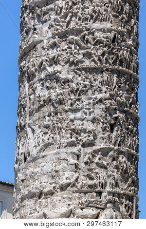 Architectural Detail From Of Ancient Marcus Aurelius Column In Front Of Palazzo Chigi In City Of Rom