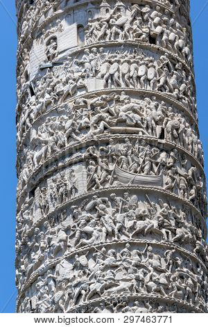 Architectural Detail From Of Ancient Marcus Aurelius Column In Front Of Palazzo Chigi In City Of Rom