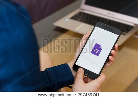 San Francisco, Us - 22 April 2019: Close Up To Female Hands Holding Smartphone Using Google Forms Se