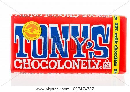 Winneconne, Wi -  19 April 2019: A Package Of Tonys Chcoconely Chocolate Candy Bar On An Isolated Ba