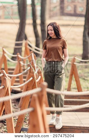 Woman Relaxing In The Forest On Weekeend