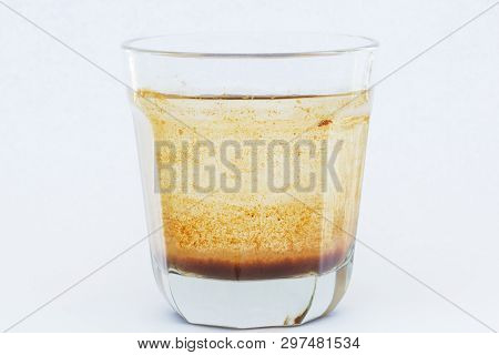 Contaminated Water In A Glass