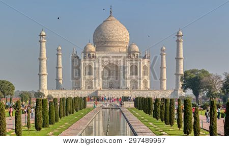 Agra, India - March 5 2018: Tourists Sighteseeing, Exploring And Admiring Famous The Taj Mahal