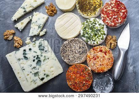 Colorful Assortment Of French Fresh White Soft Goat Cheeses With Different Tastes Topping Made With 