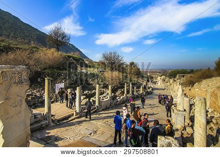 Selcuk, İzmir Province, Turkey - Dec 2015: Tourists Walking Along Curete Street In The Ruins Of Ephe