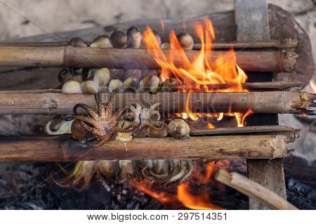 Squid Grilled On The Beach. Local Area Isherman Cooking Style.