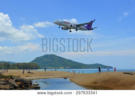 Phuket, Thailand - Apr 4, 2019. An Airbus A320 Airplane Of Thai Smile (hs-txg) Landing Above The Bea