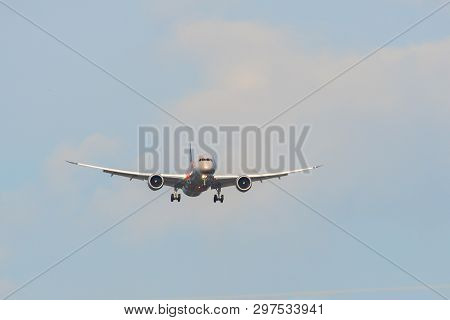 Passenger Airplane Landing At The Airport